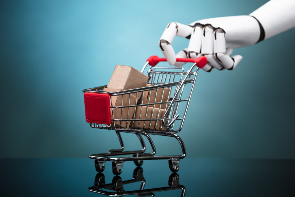 Tangentia | Robot Holding Shopping Cart With Cardboard Boxes